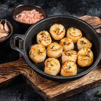 seared scallops in cast iron pan